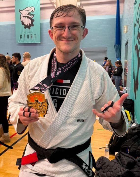 Photo of Mike Buckman Cowling post competition, where he won a bronze medal.